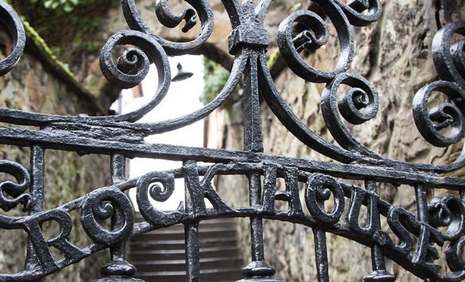 The wrought-iron gate at Rock House, reading Rock House, at the entrance to the garden on Calton Hill